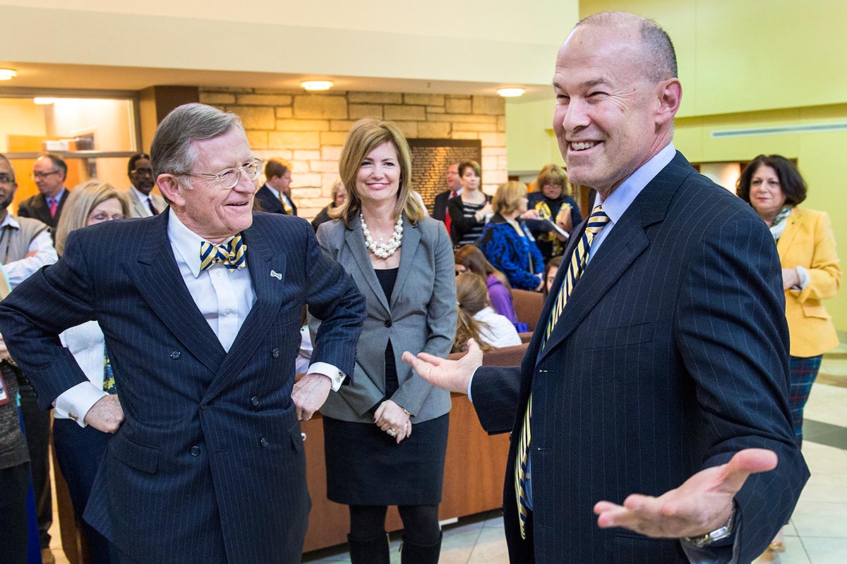 Clay Marsh sharing a moment with President Gorden Gee in the Pylon Common Area at the Health Sciences Center.