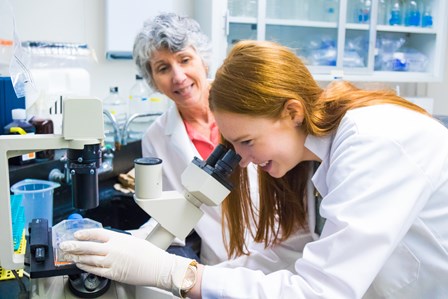 Photo of a student working in a lab