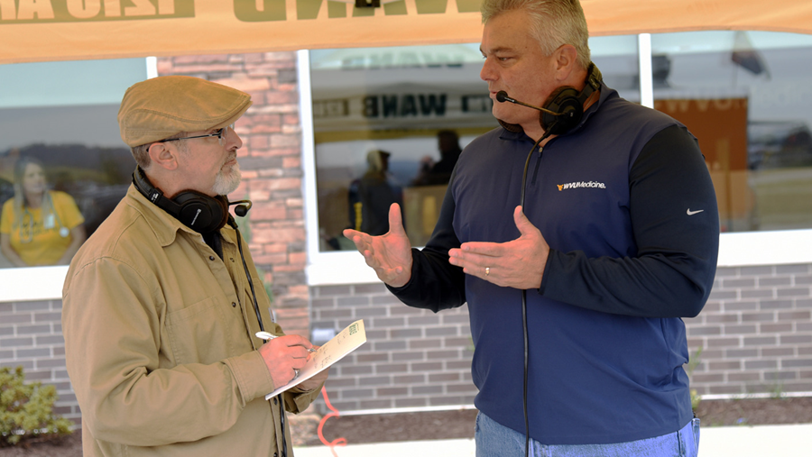Doug Wilson, WANB radio broadcaster (left) interviews Darin Rogers, Vice President of Provider Network Services and Ambulatory Operations.