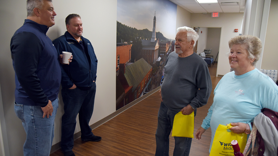 Darin Rogers and Dr. Donley (left) meet patients from the community during Waynesburg's Open House.