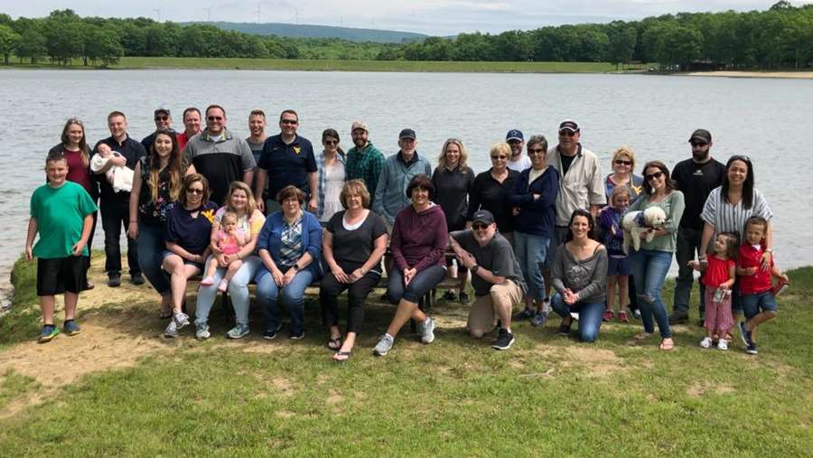 Some of Community Practice's Faculty, Staff and their families gather for some fun in the sun during 2019's Summer Picnic at Broadford Lake, Oakland, MD.