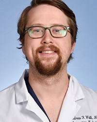 A photo of Andrew Wall.