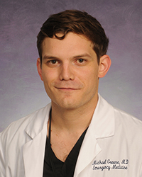 A photo of Michael Greene.