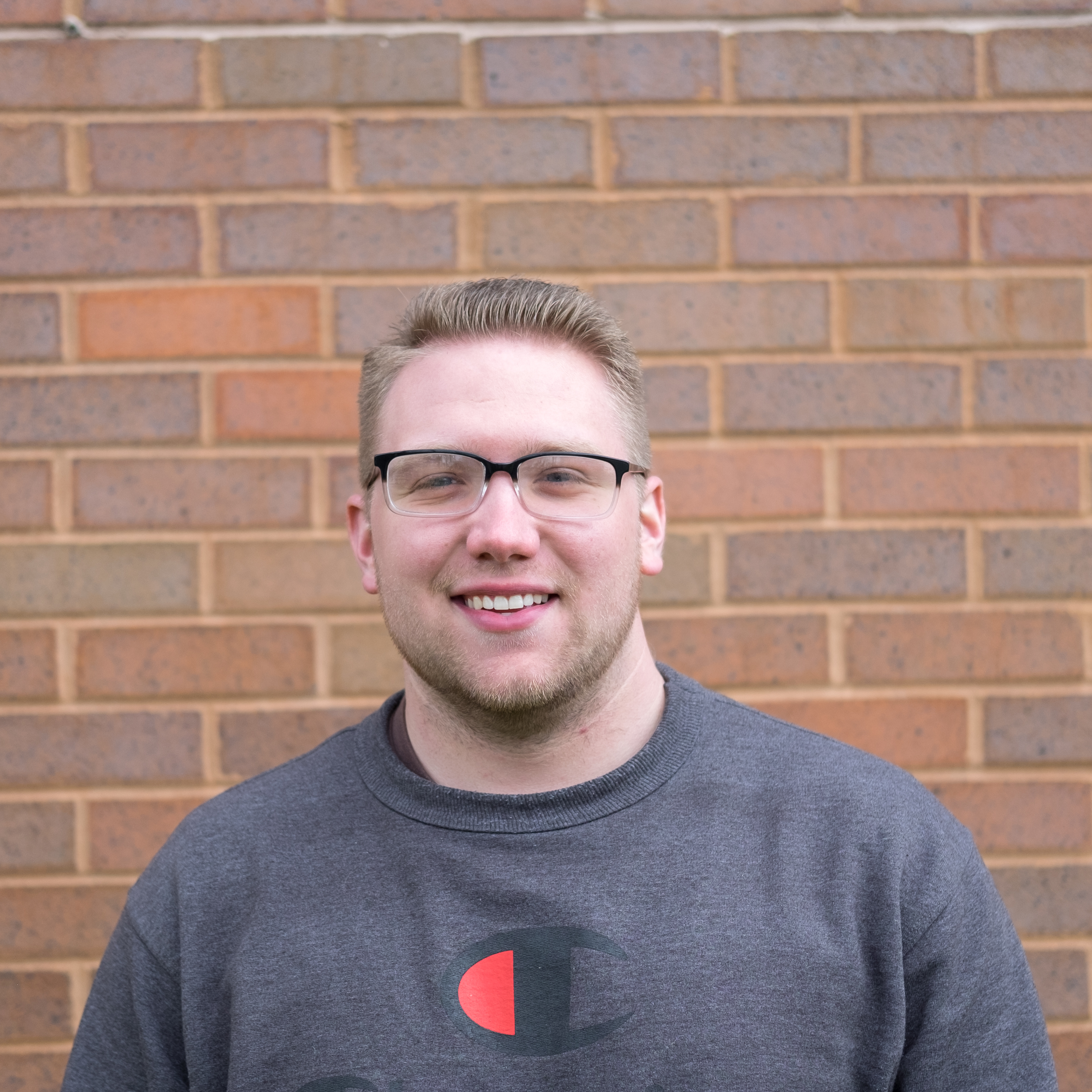 A headshot photo of Travis Harding.