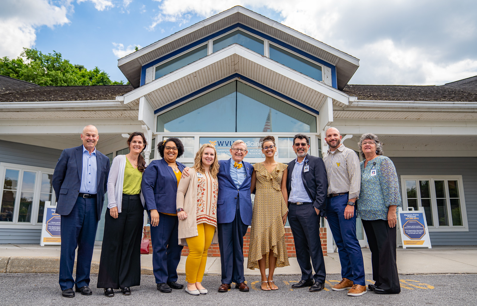 WVU leadership poses with Rural Family Medicine Faculty outside of Harpers Ferry Family Medicine clinic