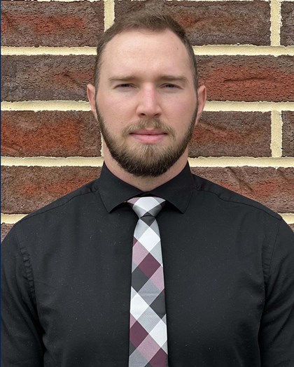 A head shot photo of Charles McCool.