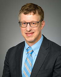 A headshot photo of Christopher McCartney, MD.
