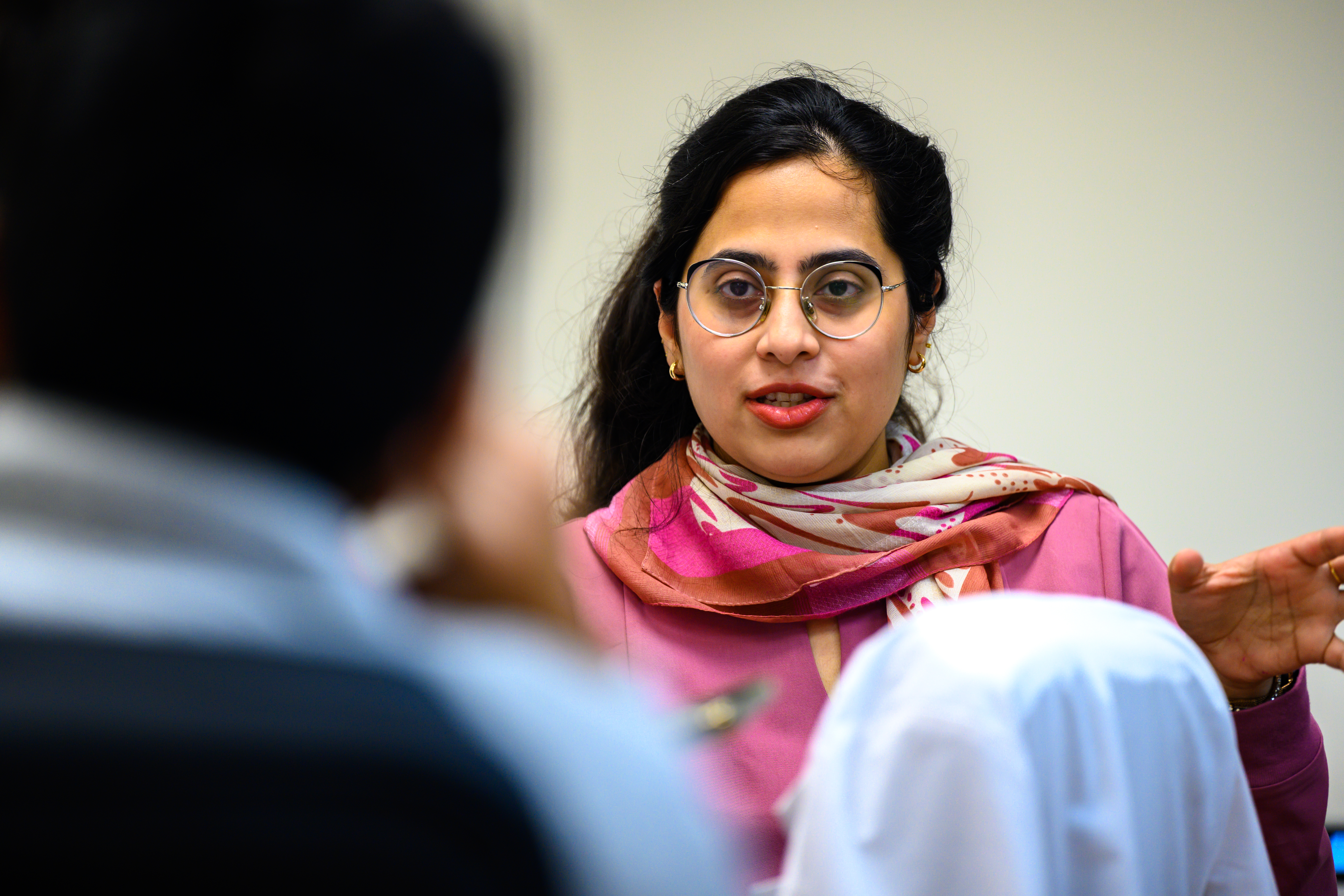 Residents discuss treatment options for a patient