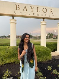 Smiling woman in front of Baylor University Sign