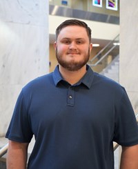 Smiling man in polo shirt
