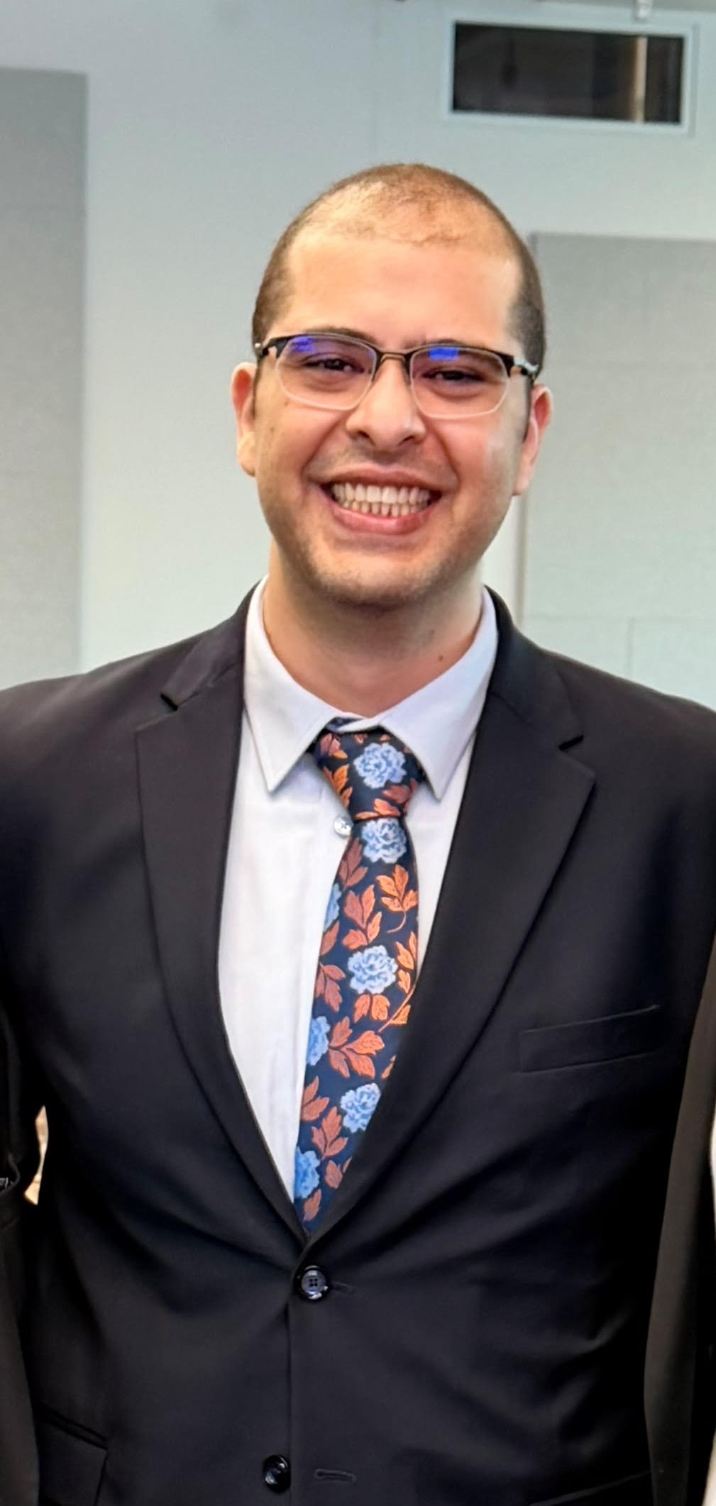 A head shot photo of Tark Abou-Elmagd.